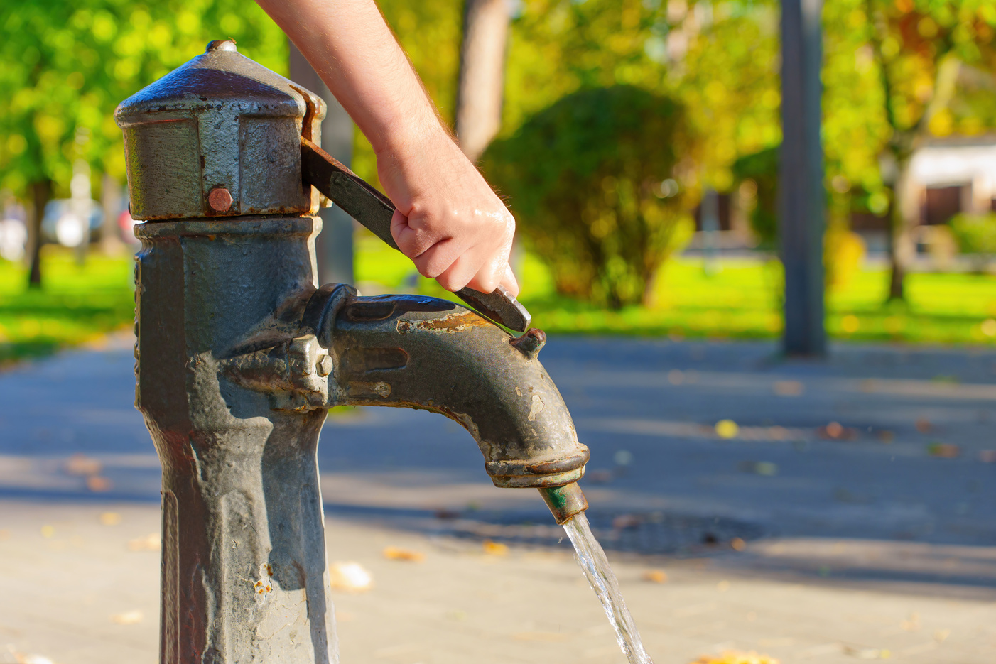 Pumping water from the hand pump well